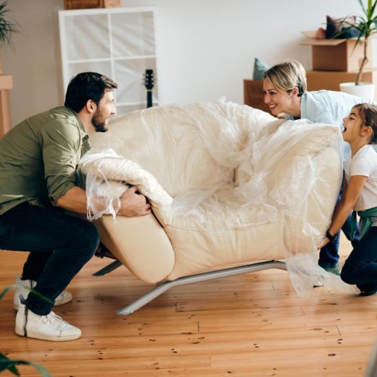 happy-family-carrying-furniture-their-new-home1 happy-family-carrying-furniture-their-new-home1